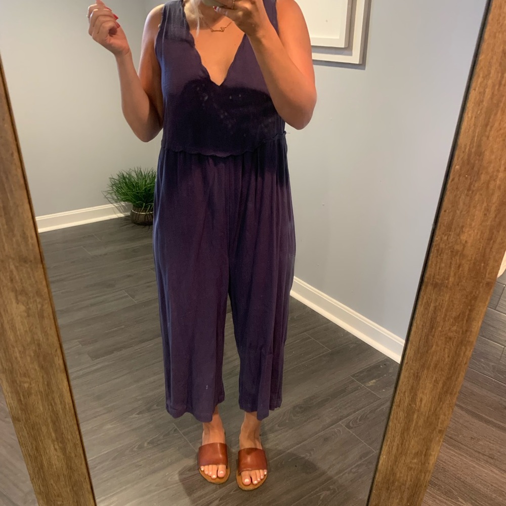 Navy blue jumpsuit. Very loose and comfortable.